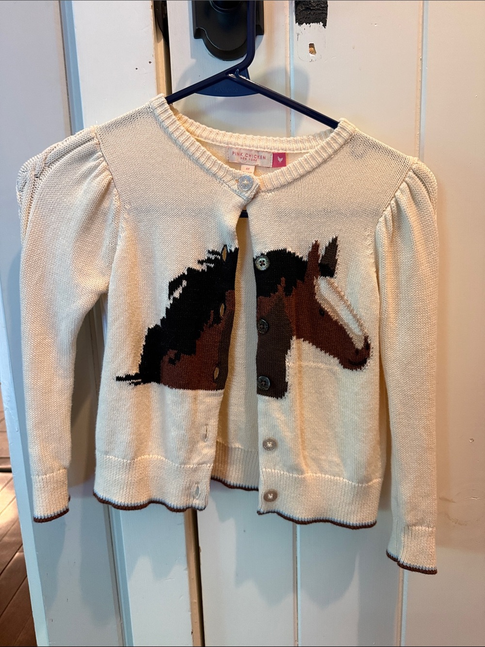 Pink Chicken Cream Horse Intarsia Cardigan with Brown & Black Details